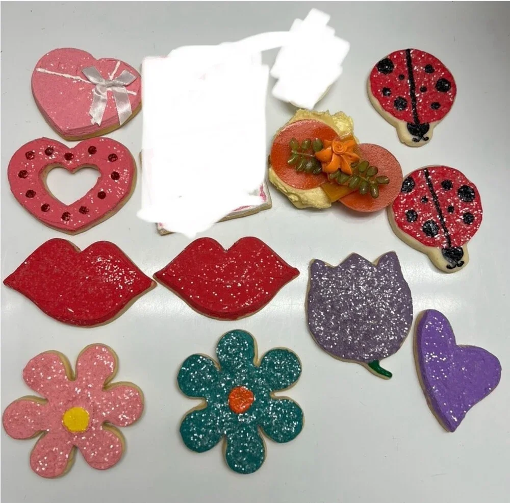 assortment of faux cookies ladybug flower heart lips love valentinea day decor
